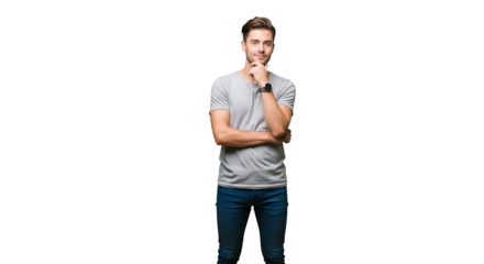 A man in a gray shirt and jeans standing with his arms crossed and his hand on his chin posing on transparent background