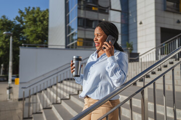 Fototapeta premium african american woman enjoy on coffee break have a phone call