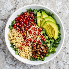 A organic salad with kale, avocado, quinoa, and pomegranate seeds, a colorful nutrient-packed bowl.
