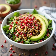 A organic salad with kale, avocado, quinoa, and pomegranate seeds, a colorful nutrient-packed bowl.