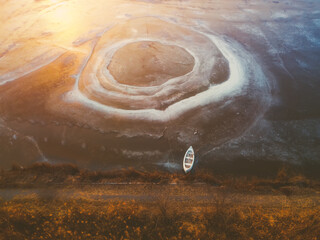Lonely Boat and Mysterious Vortex at Sunset