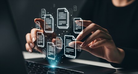 Hands interact with glowing digital document icons around a laptop, symbolizing modern data management and workflow