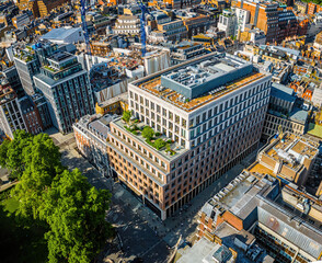 Aerial view of Hanover Square and Oxford Street area in London, featuring the entrance to Bond Street (Elizabeth line) station and city streets.