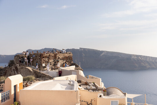 Wide angle view of tourists visiting Santorini, Greece 