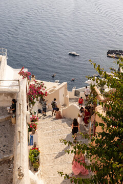Wide angle view of tourists visiting Santorini, Greece 