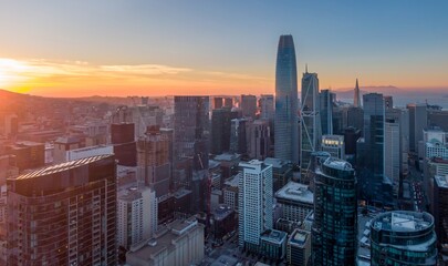 Aerial view of the San Francisco skyline at sunset in California, USA. The photo captures the...