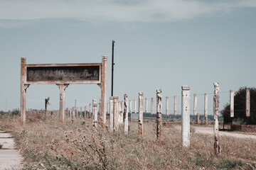 Abandoned railway sign. Empty for copy-pasting a name for design.