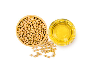 Glass bowl of soybean oil with soybeans in wooden bowl isolated on white background. top view