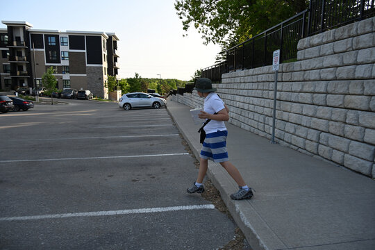 teenager in hat and white t-shirt, - Powered by Adobe