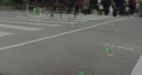 Moving pedestrians crossing crosswalk, with asphalt surface, white zebra lines and green AR icons