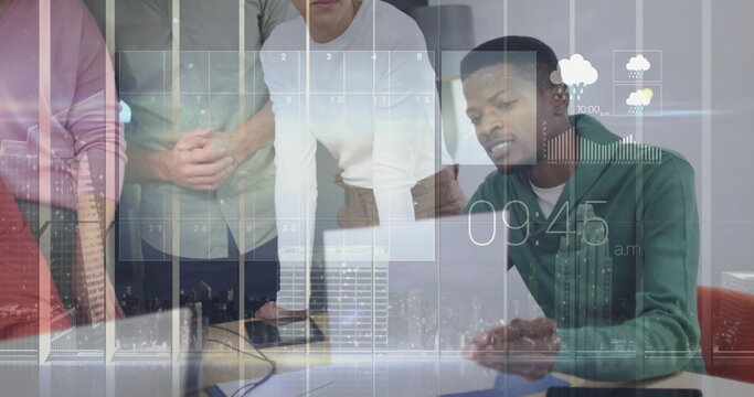 Leaning team of five colleagues reviewing laptop digital overlays in modern office, with papers - Powered by Adobe