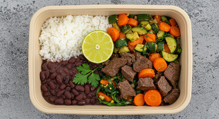 Healthy Brazilian Lunch Box Balanced Meal with Rice, Beans, Meat, and Vegetables