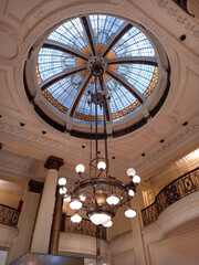 Stained glass cupola and chandelier in the restaurant of the Retiro railway station