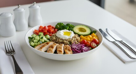 Vibrant Quinoa Chicken Bowl with Fresh Vegetables and Creamy Yogurt Dressing, a Healthy and Delicious Meal Option