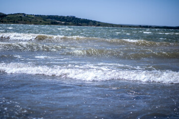 waves breaking on the beach