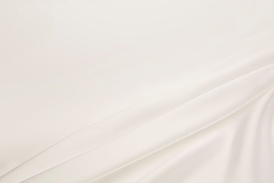 White silk drapery flowing with gentle folds