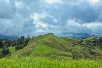 Image where you can see the peak of the mountain and some marvelous landscapes with clouds and...
