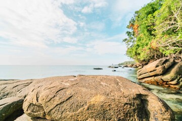 boulder on tropical beach in thailand