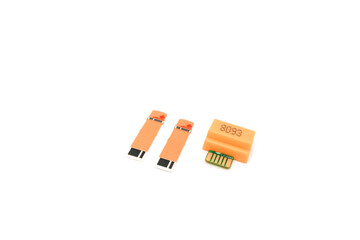 Close-up of blood glucose test strips for monitoring diabetes on white background