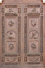 Wooden front doors of the Basilica di Santa Croce, Florence