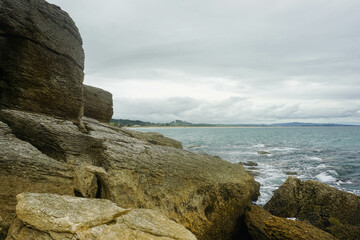 The unique and beautiful shape and composition of rocks at Waipu pancake rocks, New Zealand.