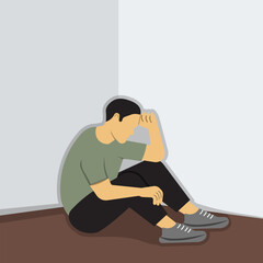 Depressed and sadness a man sitting on corner floor of room.