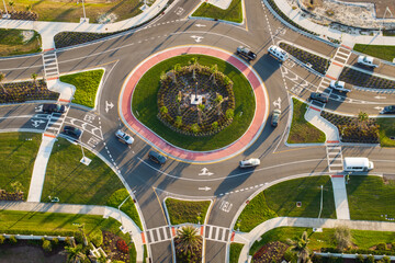 City street roundabout crossroads in Florida. Traffic infrastructure in USA. Road traffic circle...