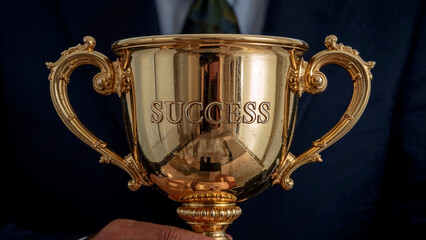 Golden trophy symbolizing success in business achievement
