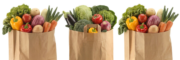 Fresh organic vegetables in brown paper bags grocery shopping on transparent background