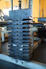 Close Up of Stacked Weight Plates in Gym