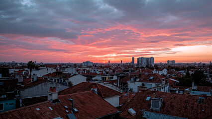 Vibrant city rooftops under a stunning sunset