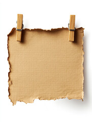 Fototapeta premium brown paper sheets hang on a string with wooden clothespins against a white background.