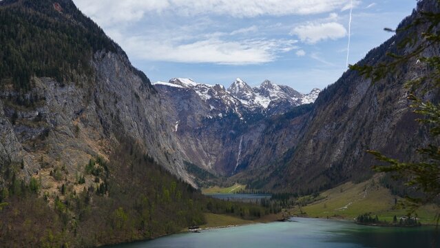 Landscape of mountains with snow on top and lake view