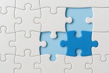 Fototapeta premium Blue Puzzle Piece Fitting Into Empty Space Among White Puzzle Pieces on a Light Background