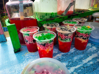 Es campur or mixed ice is an Indonesian cold and sweet dessert of tapioca pearls, grass jellies,...