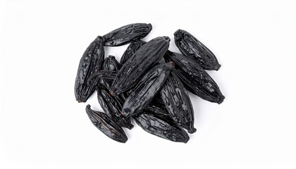 Dried tonka beans isolated on a white background. Beans of Dipteryx odorata.
