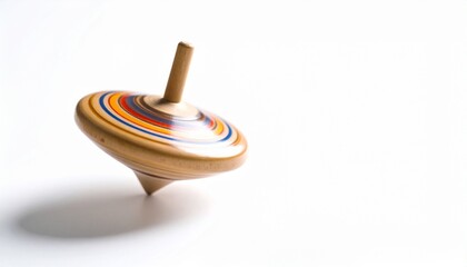  studio shot of a white and wooden spinning top on a clean white background