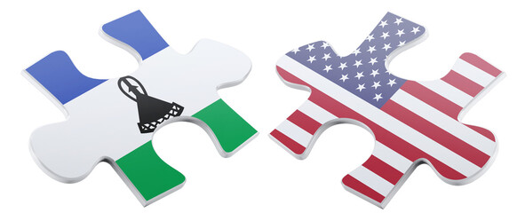 Two puzzle pieces, one adorned with the flag of Lesotho and the other featuring the flag of the United States, are poised to connect, symbolizing partnership and unity.