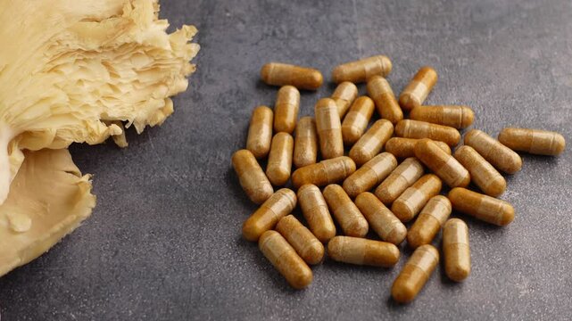 mushroom supplements and capsules on table 