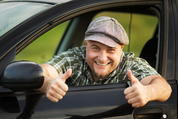 Cheerful driver shows that everything is okay.