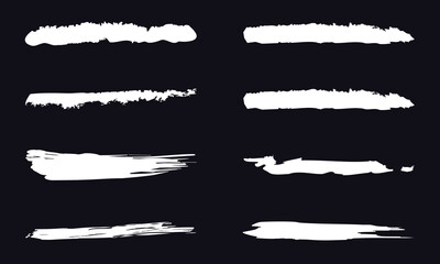 White brush stroke set isolated on black background. Trendy brush stroke vector for white ink paint, grunge backdrop, dirt banner, watercolor design and dirty texture. Brush stroke vector&nbsp;illustration