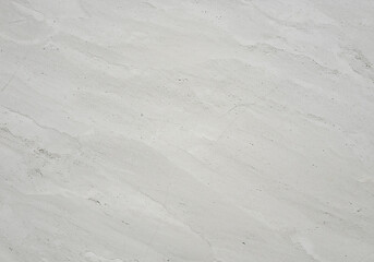 Fototapeta premium Serene Winter Landscape Smooth White Snow Textures and Subtle Undulations