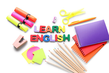 Stationery and text LEARN ENGLISH isolated on white background
