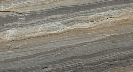 Close up shot of a stone surface with horizontal layers of gray and beige with white veins running through