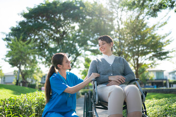Nurse gently caring for senior patient