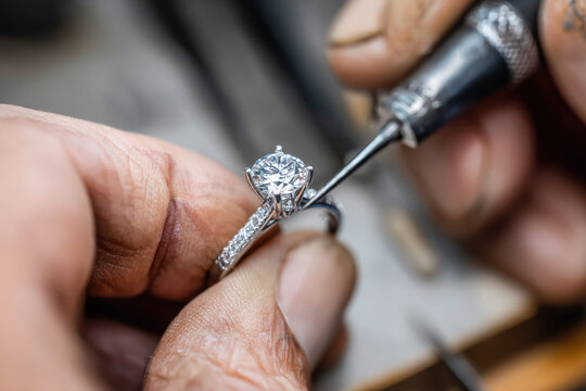 Jeweler designing a ring in a jewelry studio