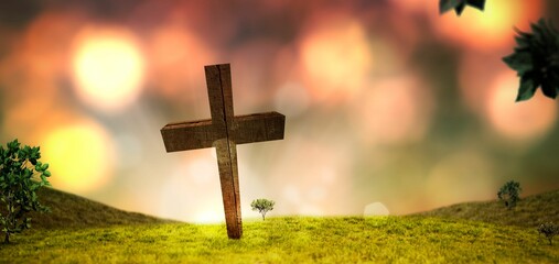 Flat illustration showing wooden cross on grassy hill with saplings, shrubs bathing in sunset bokeh