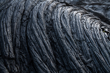 Detailed views of hardened lava formations from the Kalapana lava flow on Hawaii’s Big Island. The images capture the unique textures and natural patterns shaped by volcanic activity.