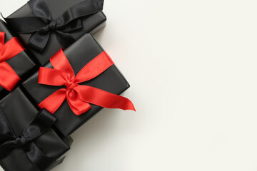 Many gift boxes on white background. Black Friday