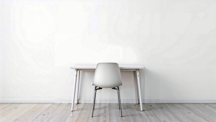 Empty white desk with chair and blank wall.